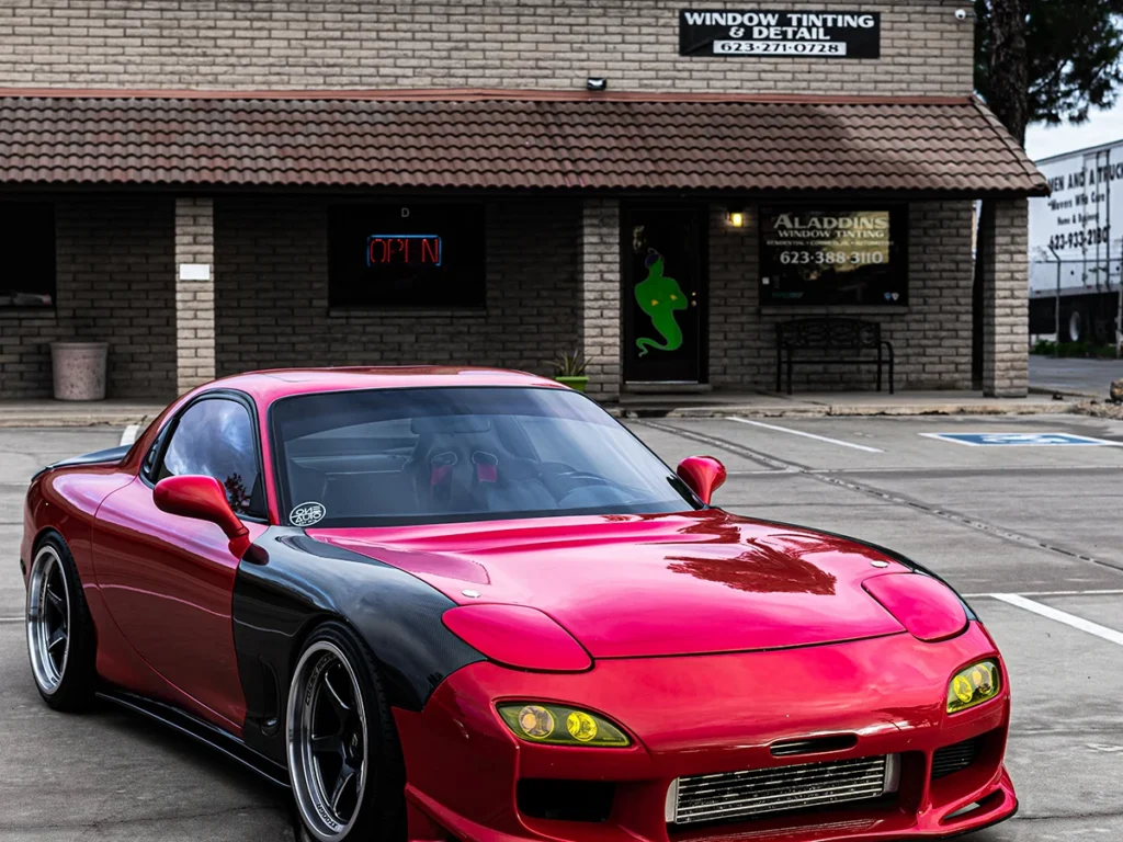 rx-7 parked in front of Aladdins Window Tinting