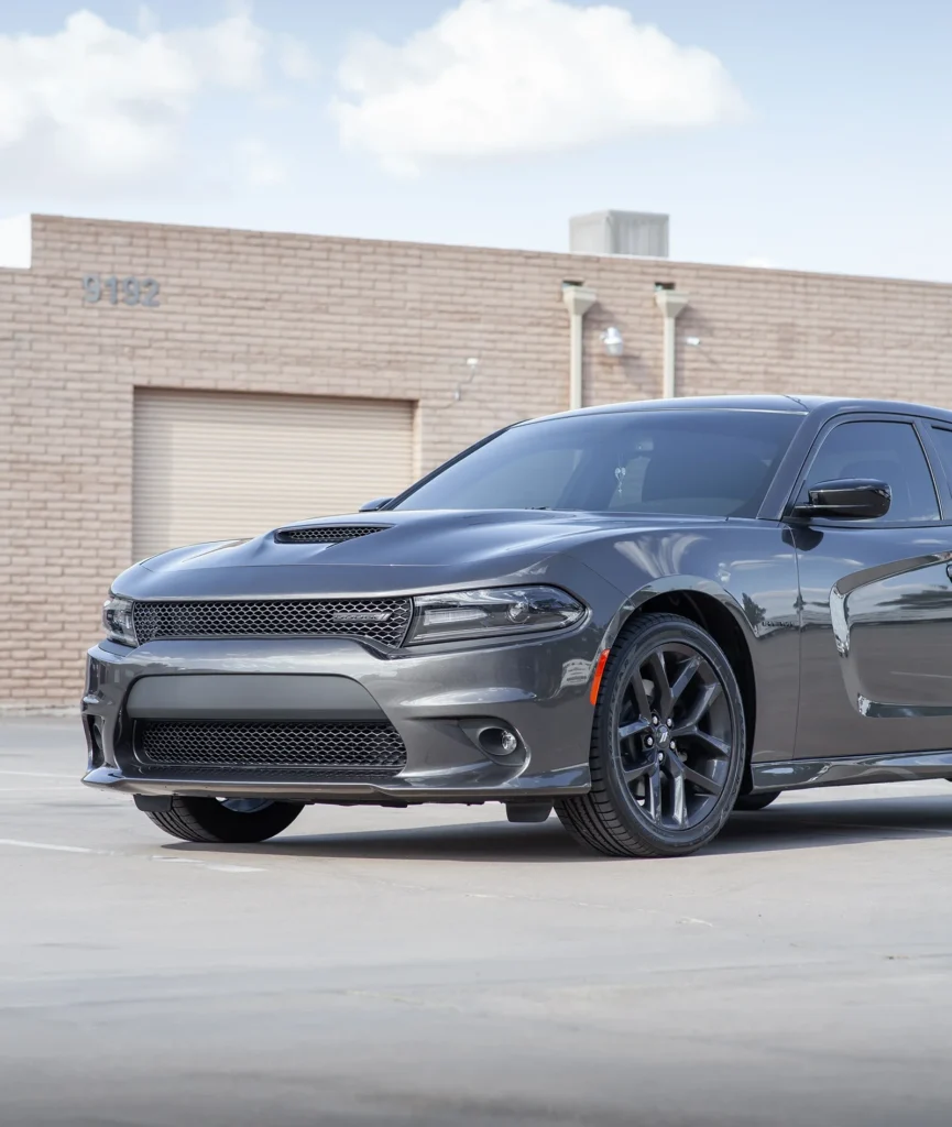 Gray Dodge Charger with SunTek Ultra paint protection film installed on the full front end at Aladdins Window Tinting in Peoria, AZ.